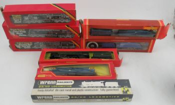 Three boxed Hornby Railways trains, together with two boxed Tri-ang Hornby trains and a boxed