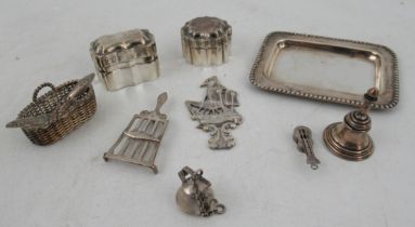 A collection of Dutch silver miniatures, to include boxes, basket with fish, tray etc