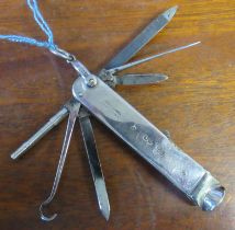 A Victorian silver smokers penknife, fitted with blades, picks, cigar cutter , stamped A. Barrett