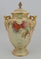 A Royal Worcester blushed ivory vase, with associated cover, decorated with flowers, with masked