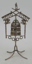 A Dutch silver miniature bird cage and stand