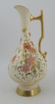 A Royal Worcester gilded ivory ewer, decorated with shot silk flowers, shape No 1040, height 30.