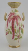 A Royal Worcester gilded ivory vase, having two handles, with pierced neck, decorated with flowers