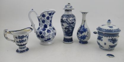 A Chinese baluster vase, together with a covered vase, a cream jug, a covered sugar bowl, all