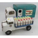 A Tri-ang Horse Transporter, together with a Tri-ang milk float with milk bottles