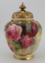 A Royal Worcester vase, with associated restored cover, decorated with roses, shape No. 1312, height