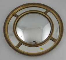A 19th century gilt framed circular wall mirror, diameter 19ins