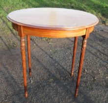 An Edwardian oval occasional table, 29.5ins x 21.5ins, height 30ins