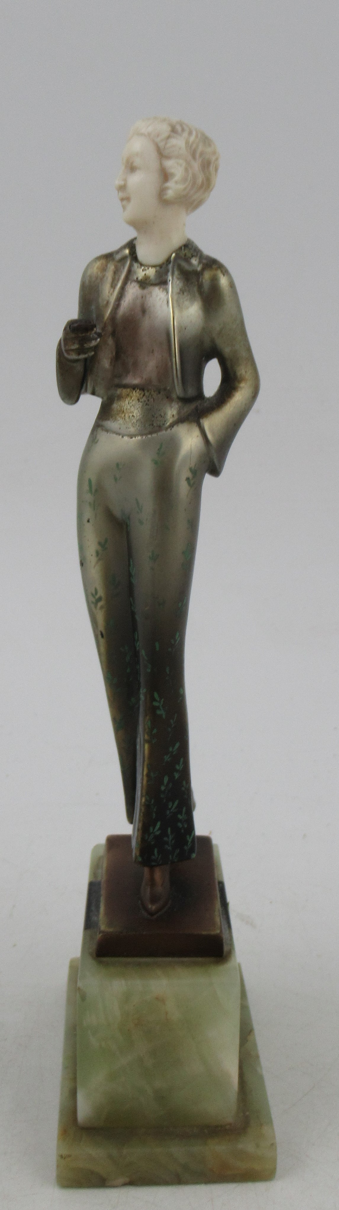 Lorenzl, a patinated bronze and ivorine figure, of a stylish Art Deco woman, signed to bronze - Image 4 of 7