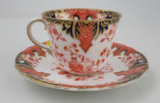 A Royal Crown Derby cup and saucer, decorated in the Imari pattern