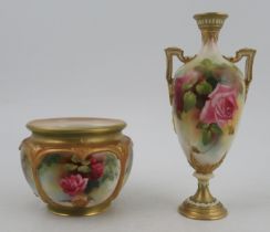 A Royal Worcester vase, decorated with roses by Flexman, shape No H247, height 7ins, together with a