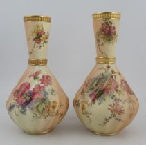 A pair of rhythm moulded blush ivory vases, decorated with flowers, shape No 1452, height 10.5ins