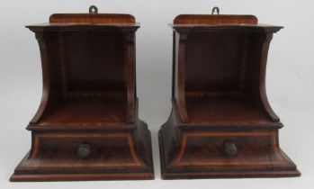 A pair of 19th century mahogany wall shelves, fitted with a drawer, the whole with satinwood