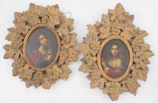 A pair of Antique oval oil on boards, portraits of woman, maximum diameter 6ins, in carved ivy