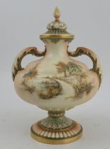 A Royal Worcester blush ivory covered vase, decorated in gilt and in colours with a landscape, shape