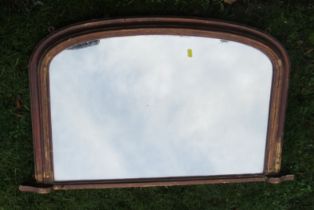 A D shaped over mantel mirror, with gilded frame, 23ins x 36ins