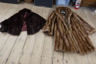 A vintage fur coat and a fur stole