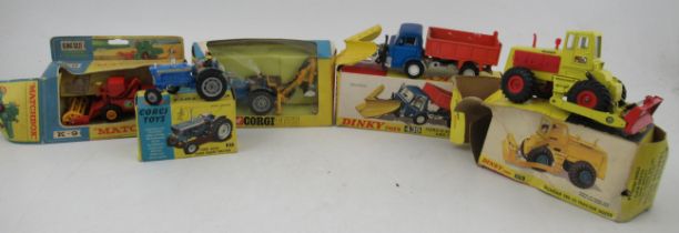 A boxed Dinky Toys Ford D.800 snow plough and tipper truck, number 439, together with other