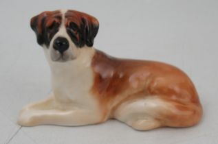 A Royal Doulton model, of a recumbent St Barnards dog, length 2.5ins