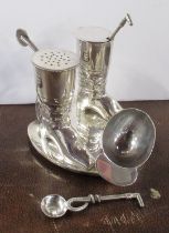 A Victorian silver plated cruet, formed as two hunting boots