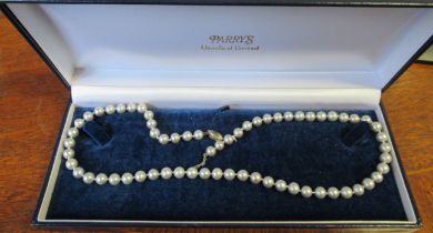 A grey cultured pearl necklace