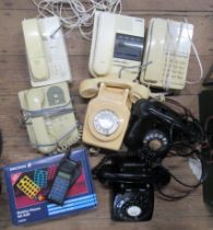A collection of telephones  to include vintage and later examples