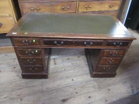 A twin pedestal desk  width 54ins, width 54ins,depth 28ins, height 30ins