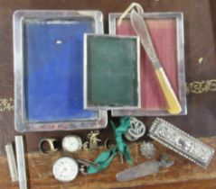 A collection of silver items, to include frames