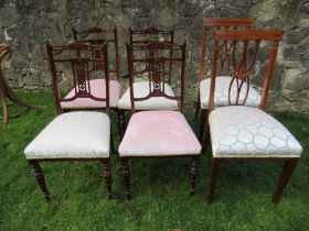 A set of four Edwardian chairs with a pair of bar back Edwardian Chairs