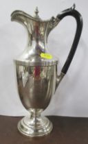 A silver water jug, engraved with initials and date to both sides, London 1906, weight 21oz all in