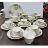 A Royal Worcester tea set, comprising a tea pot, jug, two bowls, a plate, six cups, six saucers