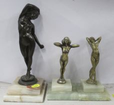 A bronze figure, of a woman, on stepped marble base, height 12ins, together with two gilded metal