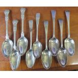 A set of four Georgian silver serving spoons, engraved with an initial, together with two other