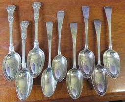 A set of four Georgian silver serving spoons, engraved with an initial, together with two other