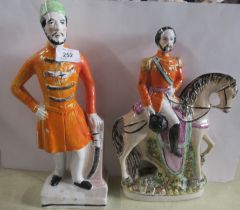 Two Staffordshire models, of an Eastern soldier and a man in horseback, height 13ins and 10ins