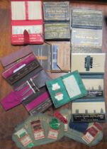 A collection of sewing sets and needle cases