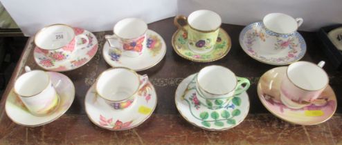 Eight Royal Worcester cabinet cups and saucers
