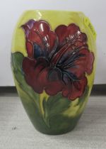 A Moorcroft vase, decorated in the Hibiscus pattern, height 5.5ins