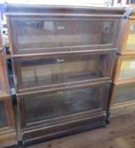 A Globe-Wernicke Co Limited three section bookcase, with glazed hinged fronts, 34ins x 12ins, height