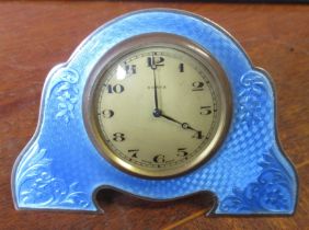 A silver and enamel clock, decorated with blue enamel, Chester circa 1939
