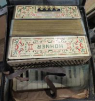 A cased Honer accordion