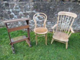 An armchair, bentwood chair and a lectern