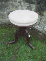 A 19th century style mahogany circular piano stool