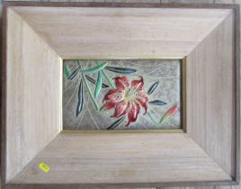 A framed Japanese rectangular enamel plaque, decorated with flowers, 7ins x 11ins