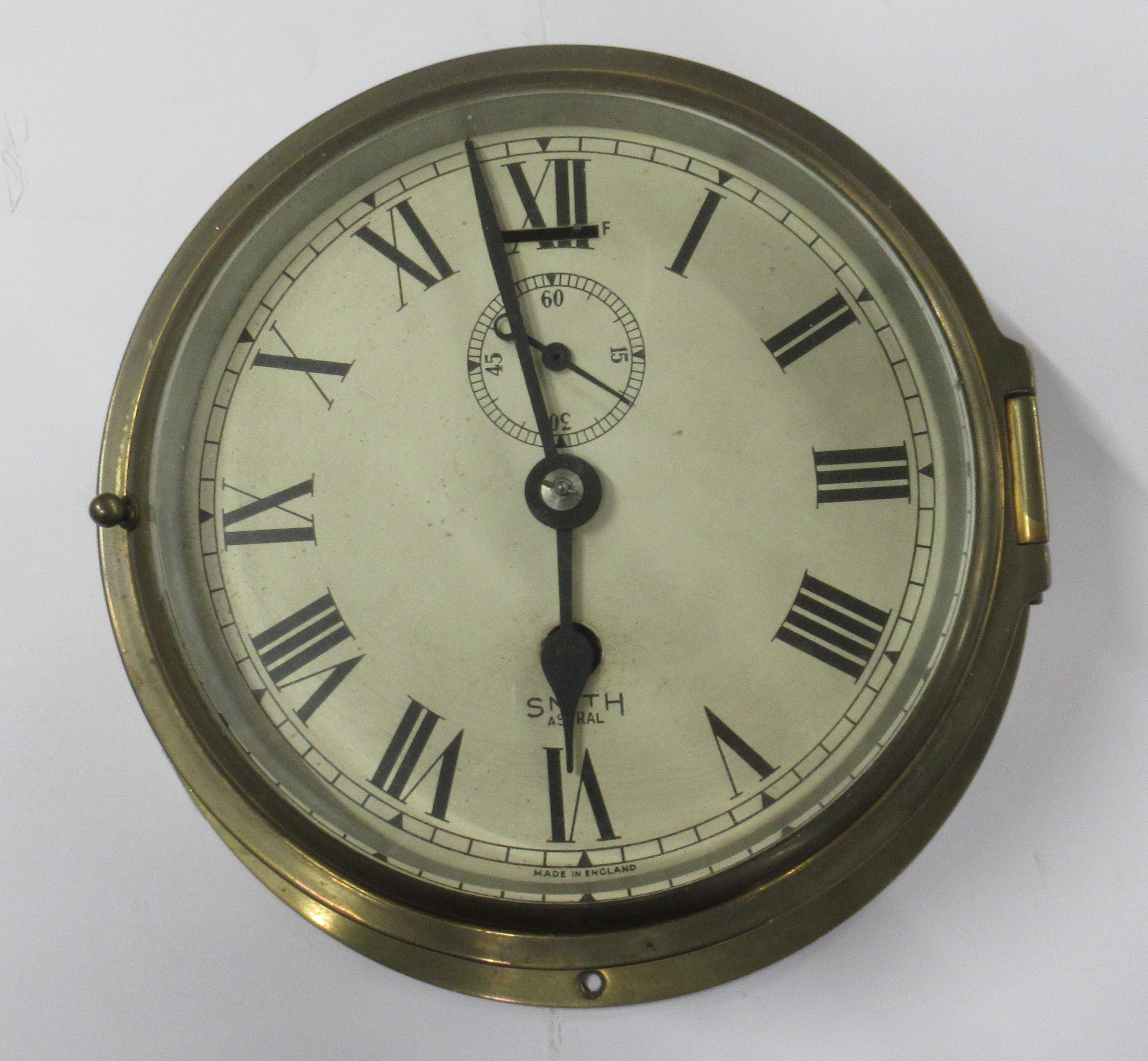 A Smith Astral brass cased wall clock