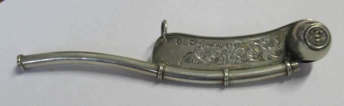 A silver bosons whistle, with engraved decoration