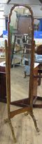 A 20th century mahogany cheval mirror, height 67ins