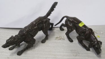 Two bronze coloured models, of dogs, length 8ins and 9ins