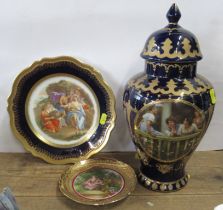 A Royal Limoges covered vase, height 15ins, together with two cabinet plates