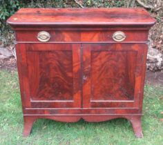 A 19th century mahogany cabinet, fitted with a frieze drawer over a pair of cupboard doors, 36ins